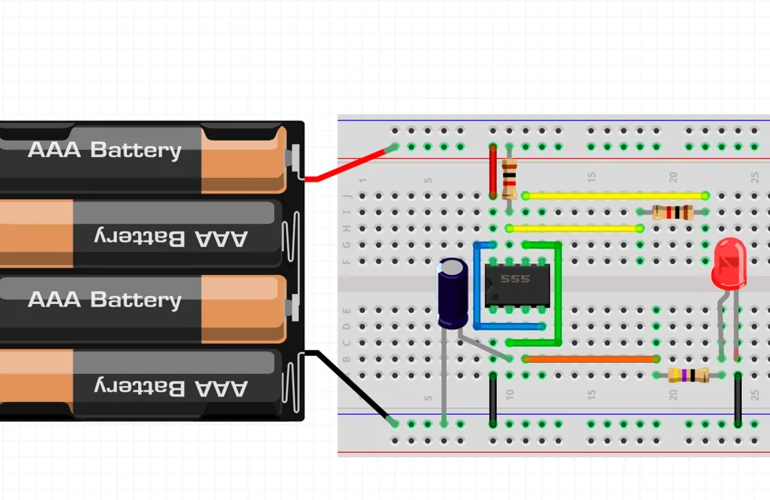 Drawing of the 555 timer astable circuit laid out on a breadboard, with the LED, timing resistors and capacitor wired to the chip