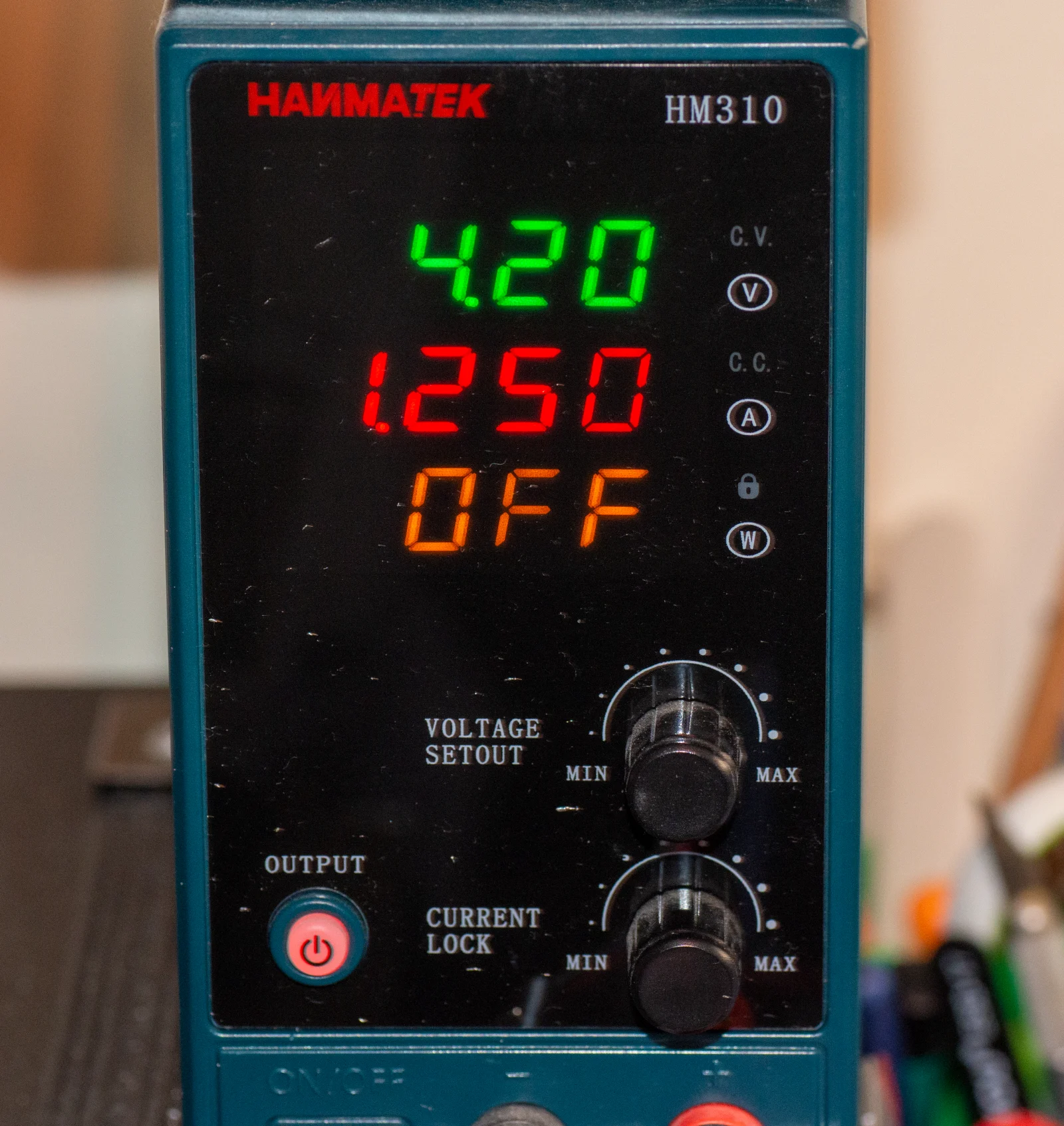 Bench power supply set to 4.2 V and 1250 mA